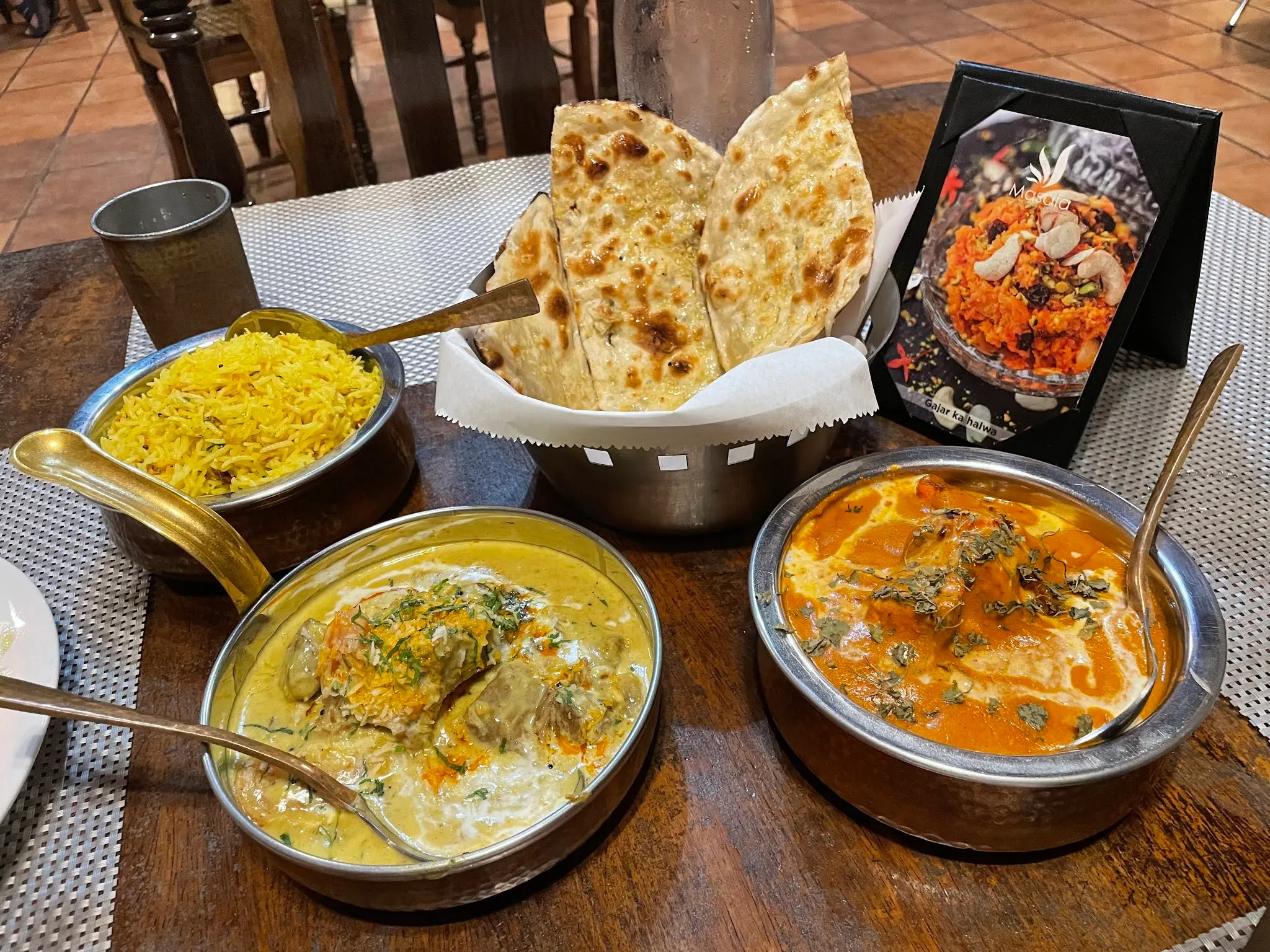 Did I tell you that this Indian food was really good. One more time…it was really good. Going counter clockwise….Lemon Rice, Butter Chicken, Beef Curry, and Garlic Butter Naan. How are those Indian’s so darn skinny!