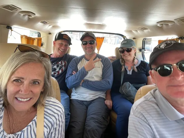 I believe this is us crammed into the van that took us to the Juliaca airport. It was a new, quite nice, van.