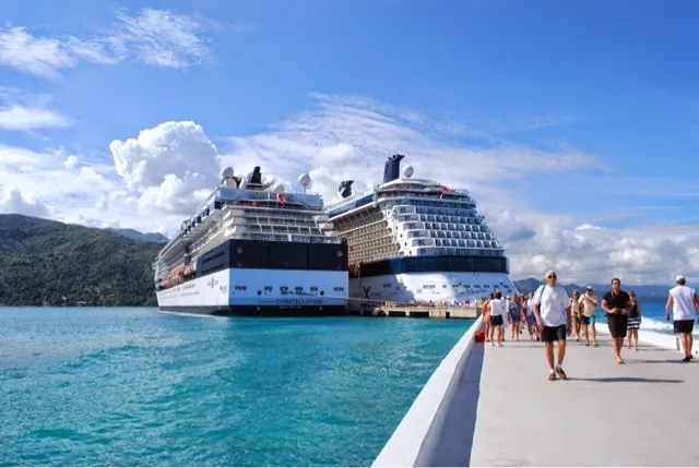 A Royal Caribbean boat parked next to ours. Ours is on the right. Approxametly 5k people came off the two boats and turned this Haiiti penninsula into a very busy place!