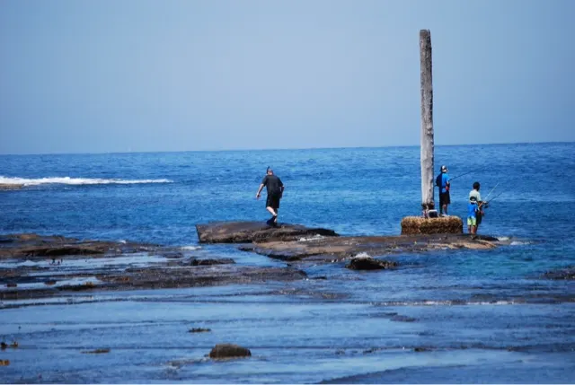 At one point, I climbed out of the water onto these rocks to avoid being the 'catch of the day'. Later I just stayed in the water and asked them if they could secure their lines...which they were happy to do.