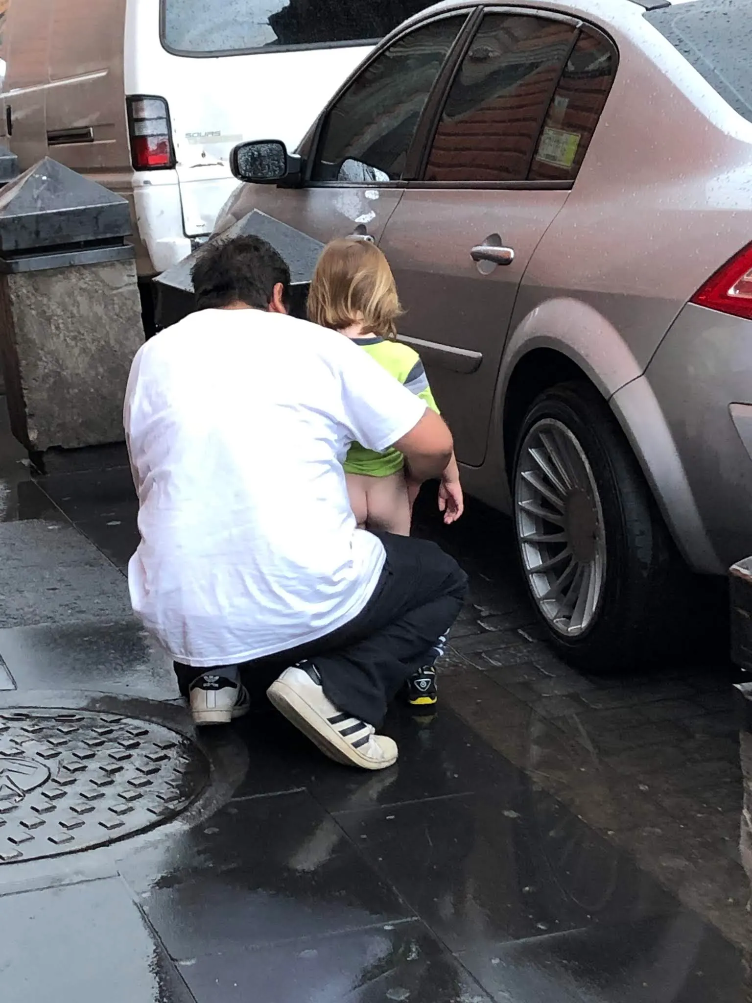 Lorenzo relieving himself in the middle of a busy street.....