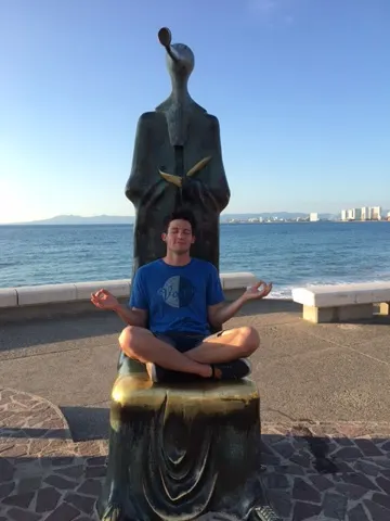 Beau practicing yoga on the Malecon....