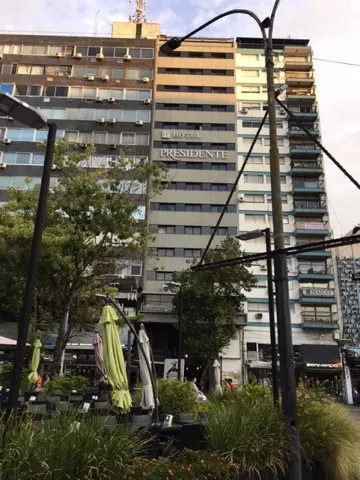 Our hotel (Hotel Presidente). We are on the third floor...our window looks like the white curtains are drawn on the far left side.