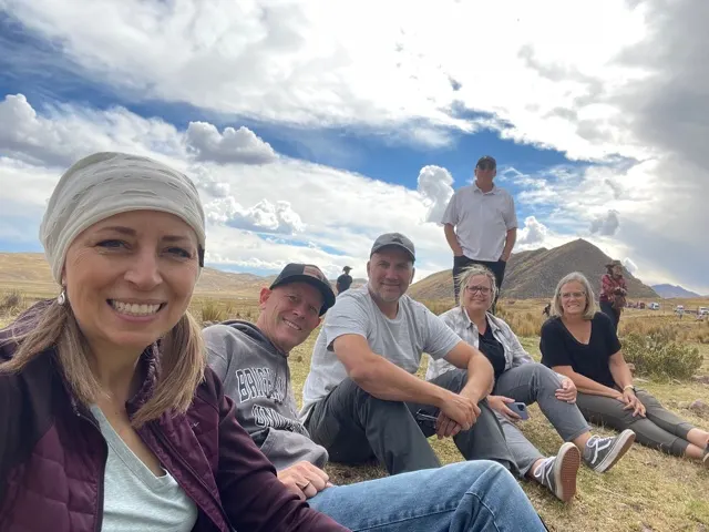 The group waiting on the side of the road to get clearance to go through the construction area. I can’t sit like that!