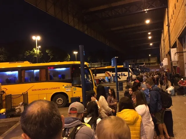 Early lines...if you look closely you can see the pole that has 29 on it. We are in line for pole 37! That is how long this line is to get on Buquebus buses.