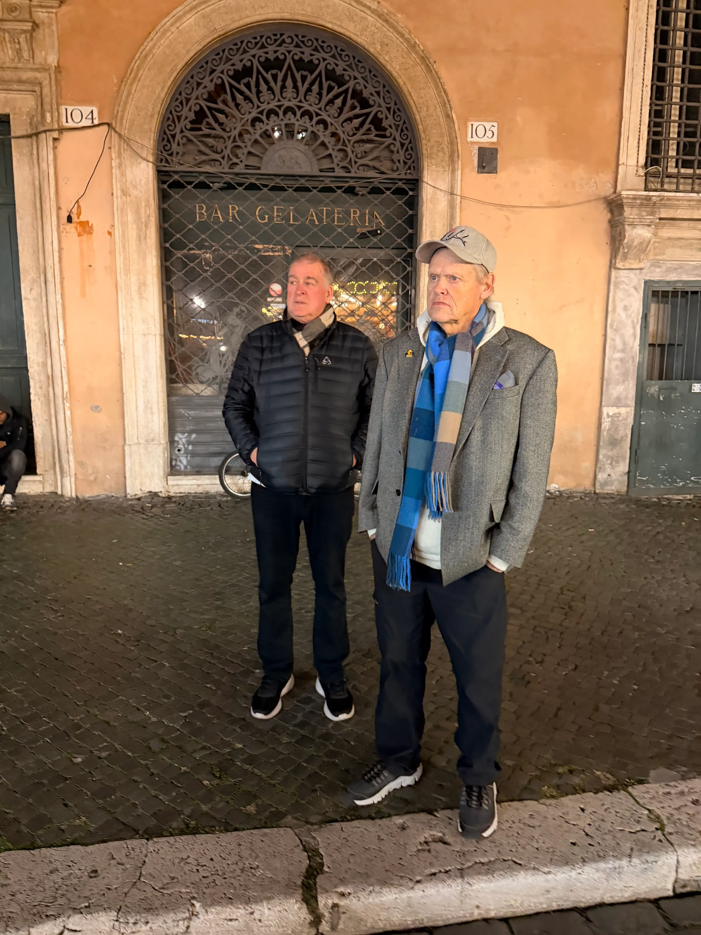 This is what Tim and Jeff did the whole time at Christmas markets and our walks everywhere we went. Hurry up and wait. You can see that we were thrilled with the opportunity to do this. <Not!>