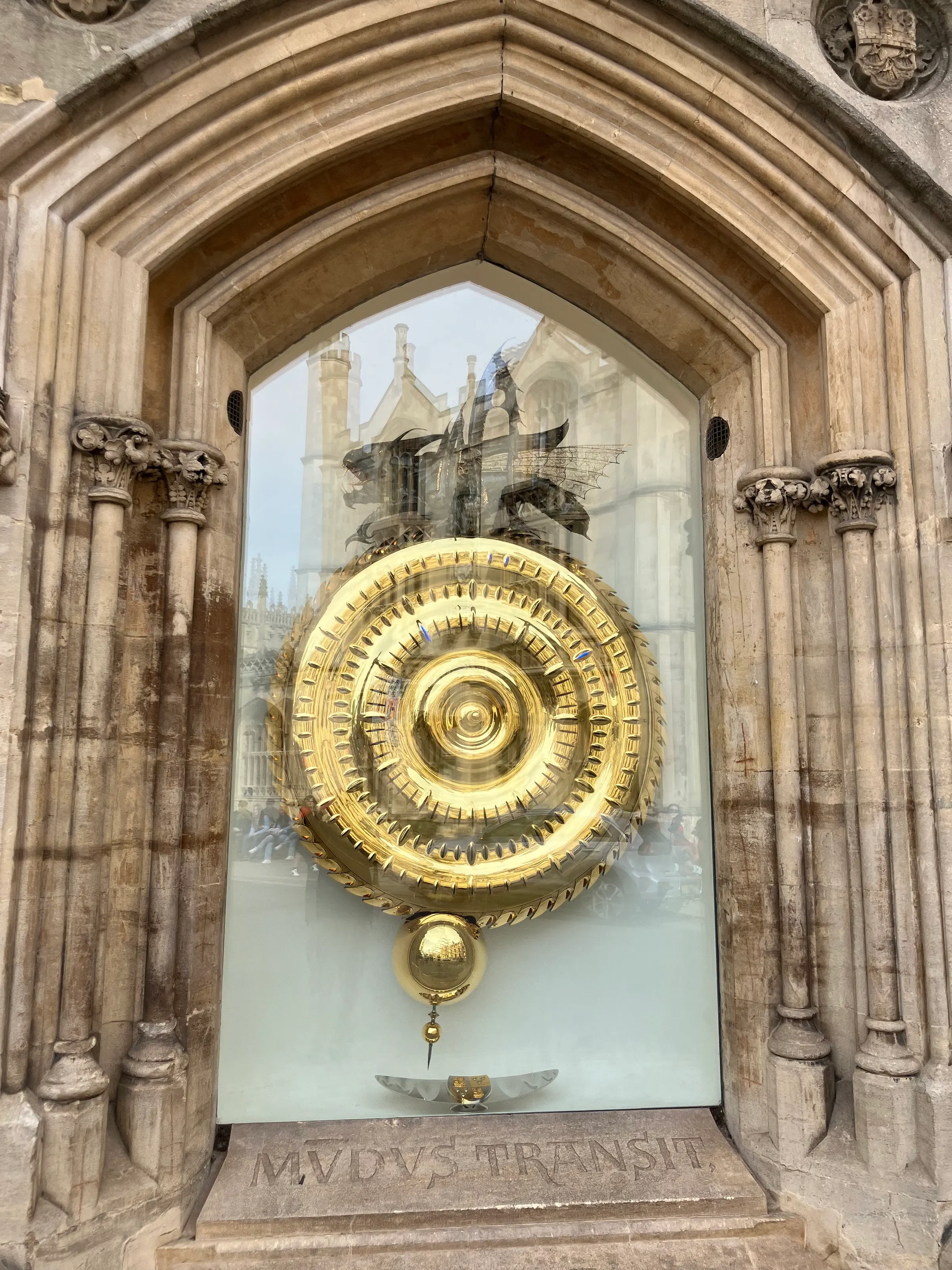 This is called the Corpus Clock I believe. It is a clock that keeps actual time even though it slows down and speeds up all the time. It self adjusts every 5 minutes due to this inconsistency.