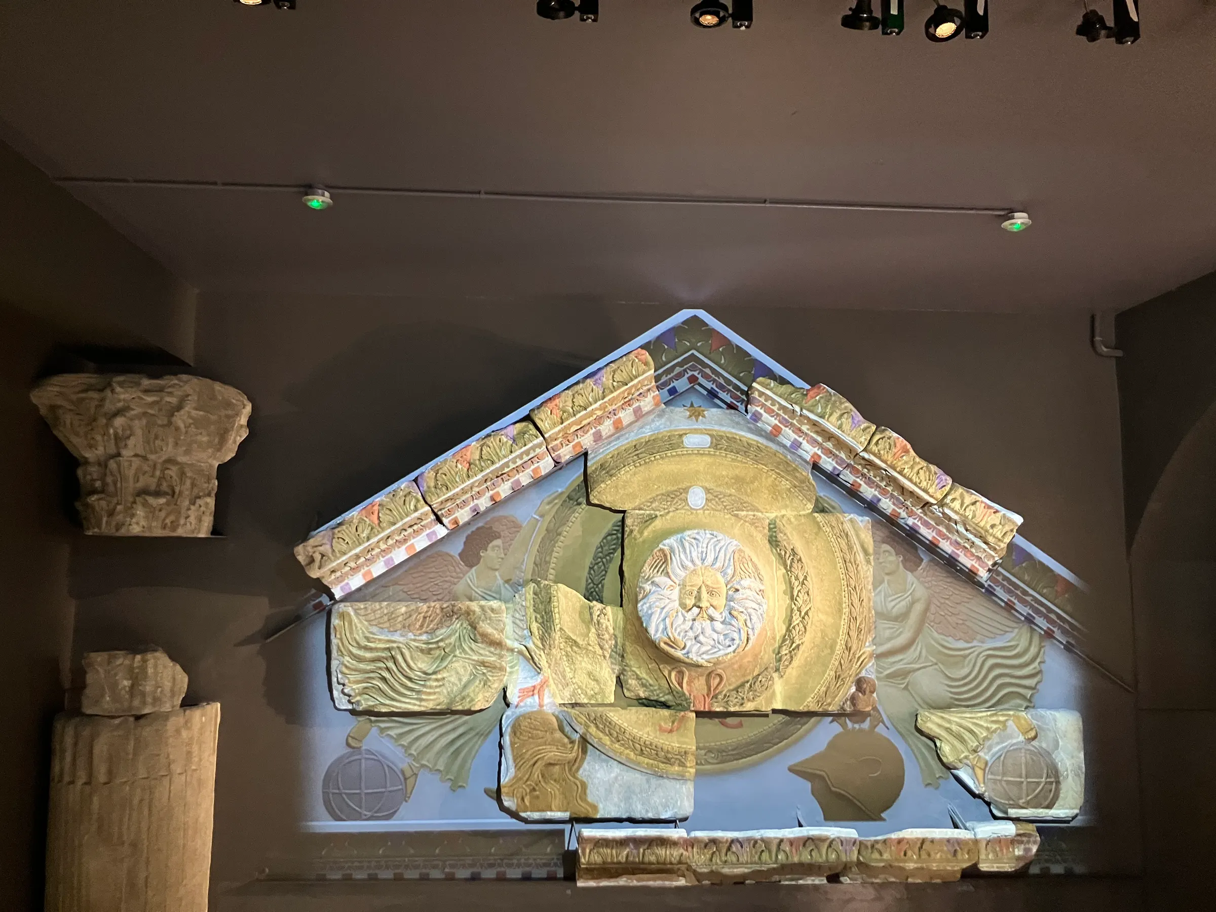 They worshiped gods that represented the sun and moon. But they threw other stuff in there too. They found lots of artifacts that they have tried to piece together like this exhibit show.