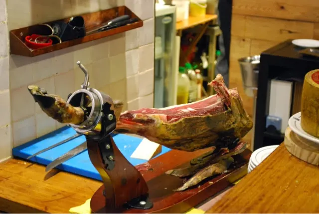 The ham shank on the carving table. It is an art here to carve really thin slices for meals.