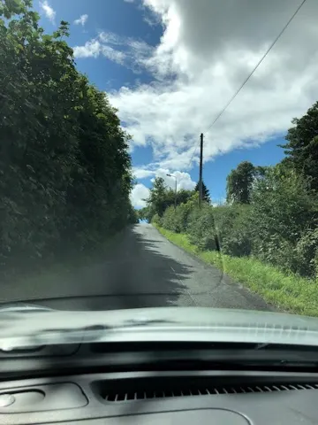 At one point in our drive to Troon, we had to take a detour. I think we missed some turn and ended up on this tiny road. But, we found our way back to the highway at the right point. All was well...