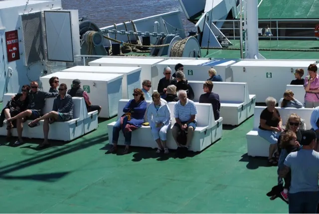Seats on the ferry....the weather was BEAUTIFUL. Cool and breezy.