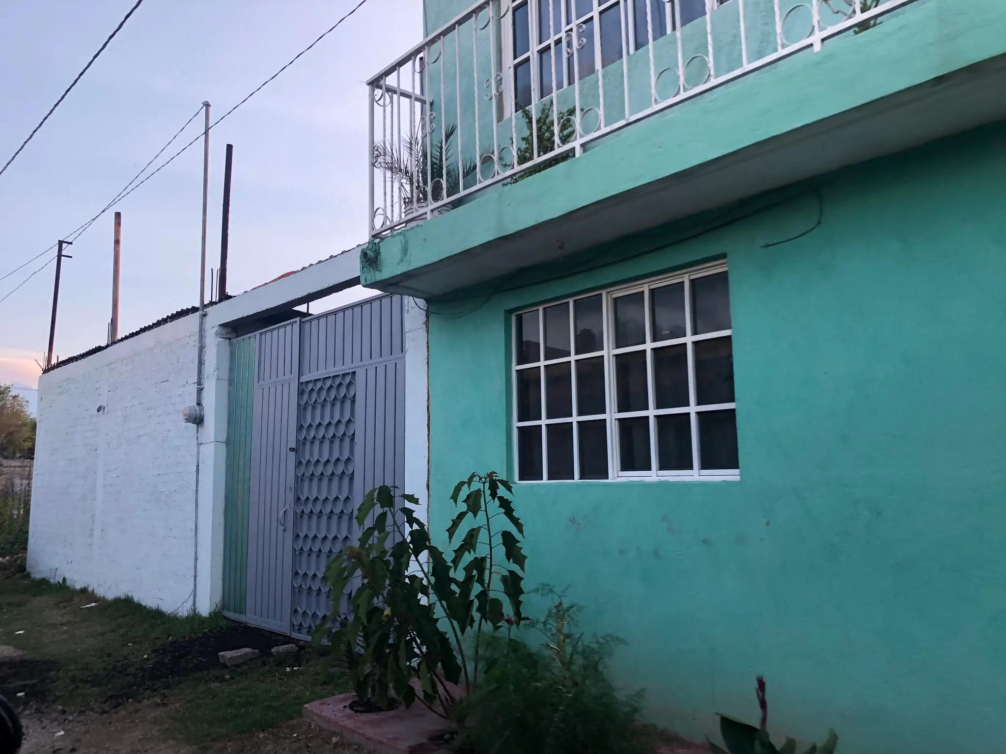 The bluish panel is the entrance to Juan and Blanca’s casita. The home to the right looks like a pretty nice two story place. But who knows what it is like inside.
