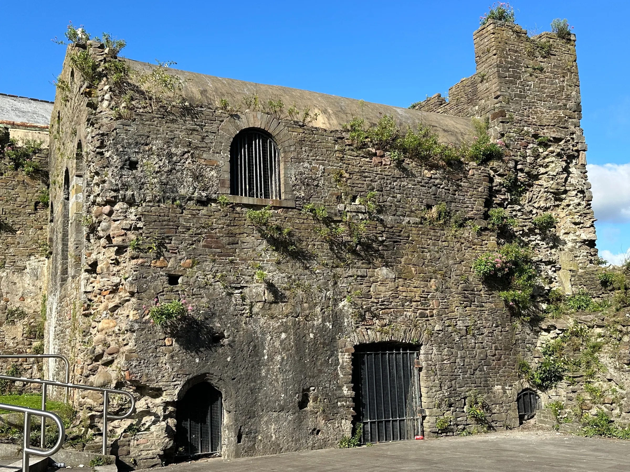 Swansea Castle. I believe it was used to hold prisoners for a time.