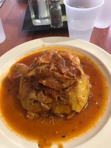 Our lunch\dinner. I can't remember the name of this Puerto Rican dish...but it was great. Mashed Plantains covered in a chicken gravy sauce.