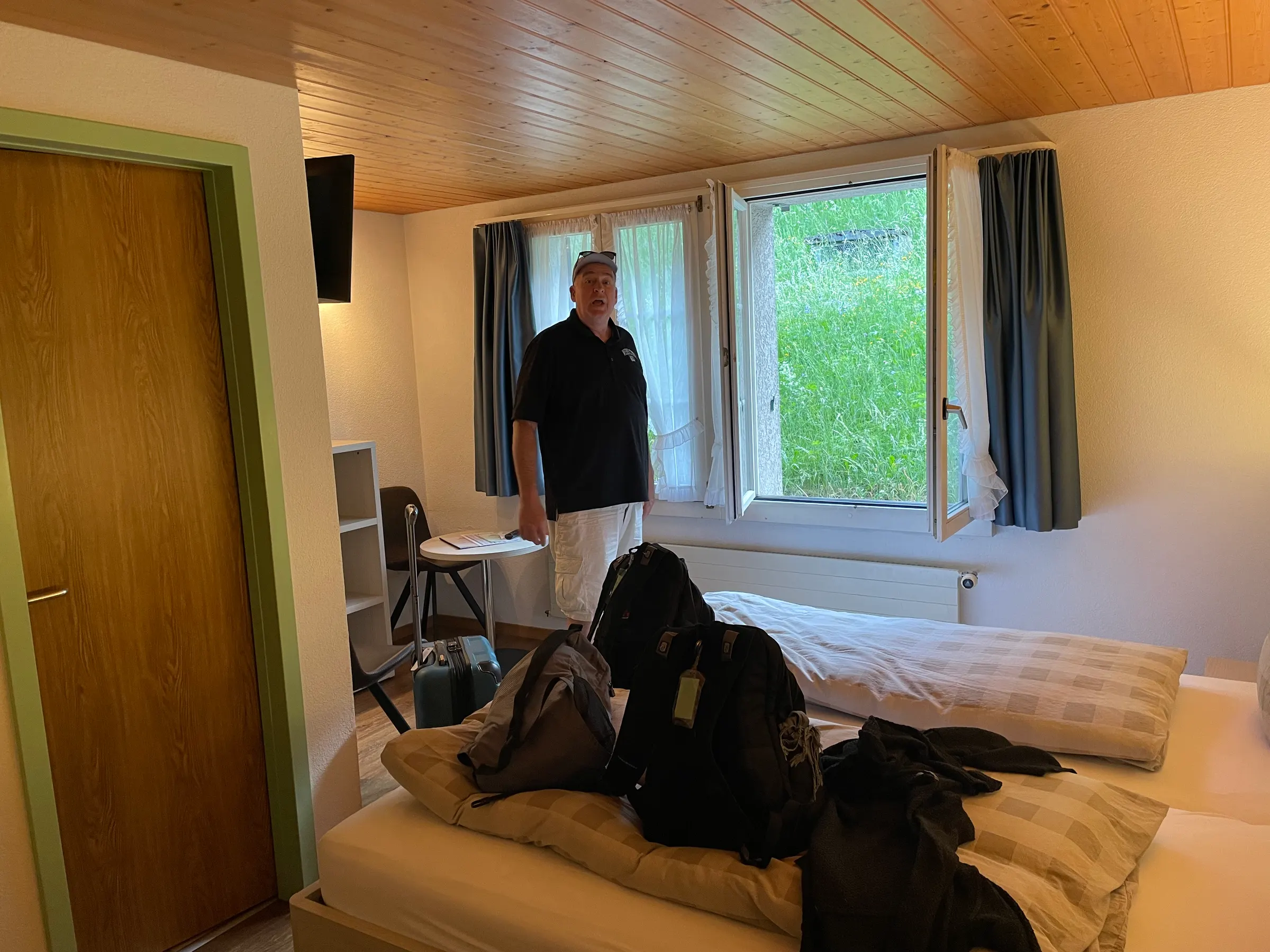 Our small room in Lauterbrunnen. At least I can stand up…unlike the BNB that Mike’s family is in. I guess the boys can’t stand up straight because their ceiling is too low. I’ll have to get a picture of that!