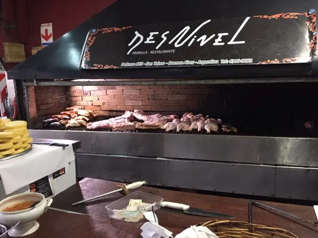 They have these in restaurants on every corner. You can see the very large chunks of beef on the grill. Cooked stuff is placed in the left corner...like suasages and other things.