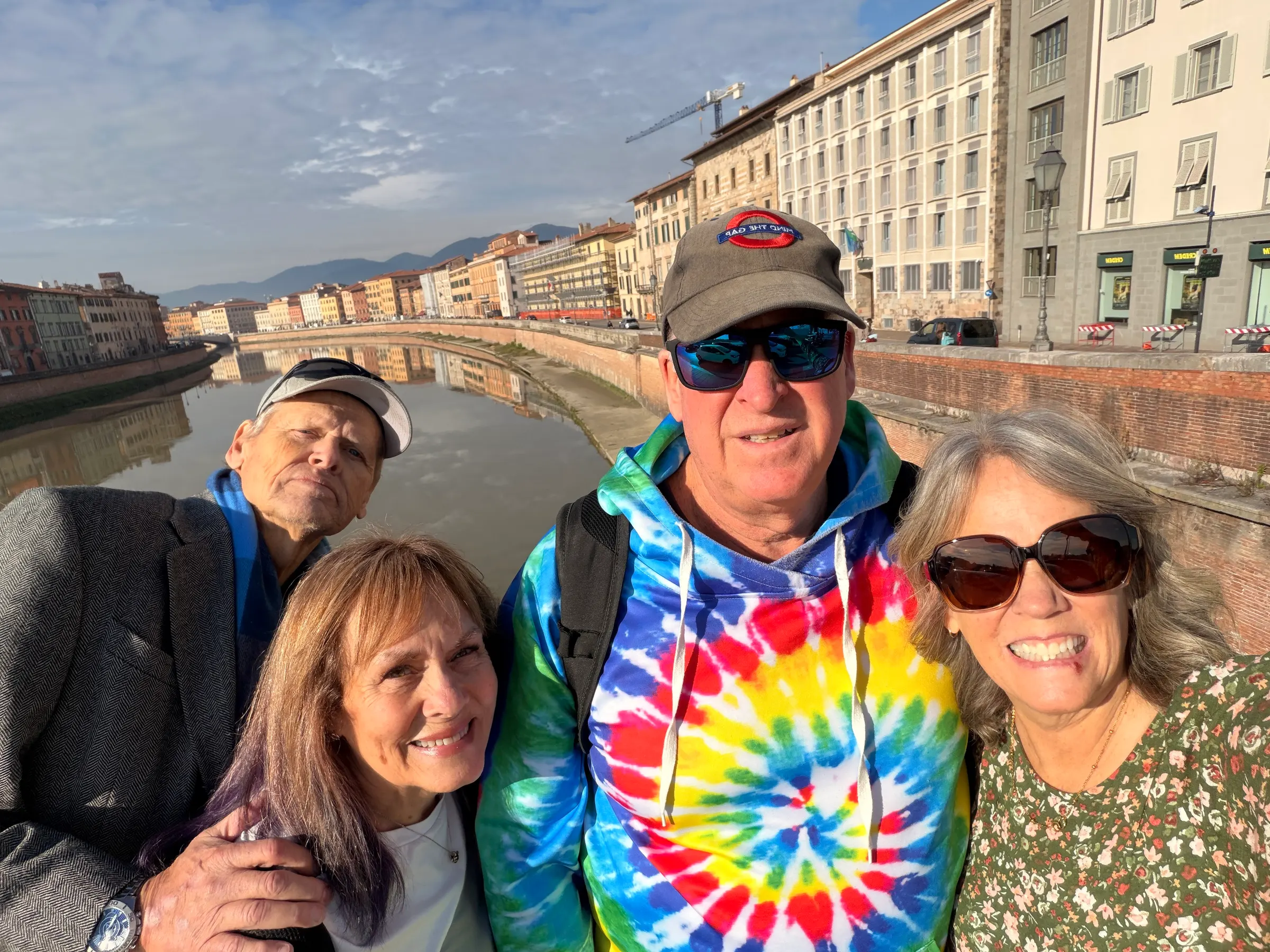 Nice group shot over looking the muddy river that runs through Pisa.