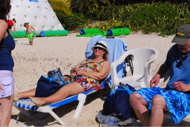 Ahhh....the beach life (Denise getting a beautifully bronzed body!)