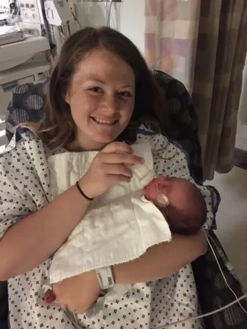 Lorenzo taking a bottle....so glad his health is improving. Hopes to go home from hospital on Friday.