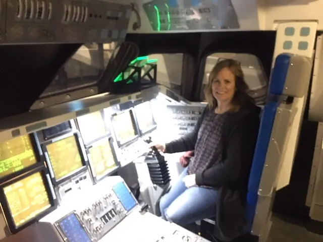 Denise at the helm of a shuttle...