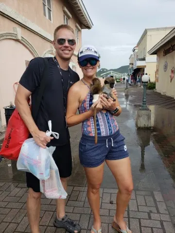 Brent and Ashley were thrown monkeys to catch and then the person wanted $10 for the picture moment. It is a trick that folks will do in places like this. Brent and Ashley paid. :-)