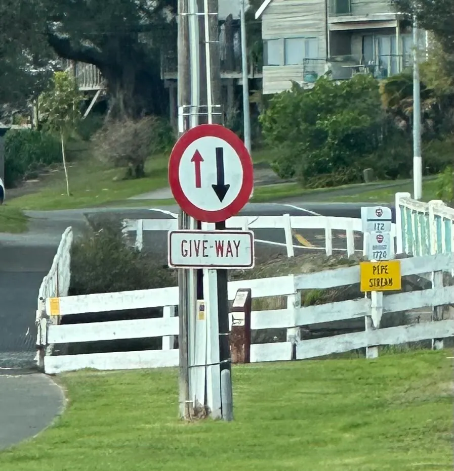 Ahhh…brings back times in England with these type of give way signs. There are lots of single lane bridges and roundabouts down here!