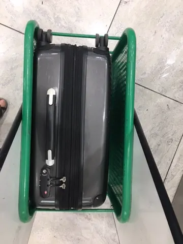 Upon arriving at the airport, we were concerned about the size of our bags for EU travel. Denise was thrilled that her bag met Aliitalia Airlines standards!