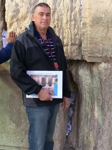 Me at the wall with my skull cap on....they let you keep those.
