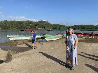 This is the small port with our boat (green one) behind Denise.