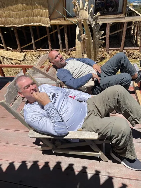 Marc and I just chillin in the sun. Maybe that is where I got so burned. And sadly, when I went to get out of the chair, it broke. The wood was pretty old and rotted. Couldn’t be my weight!