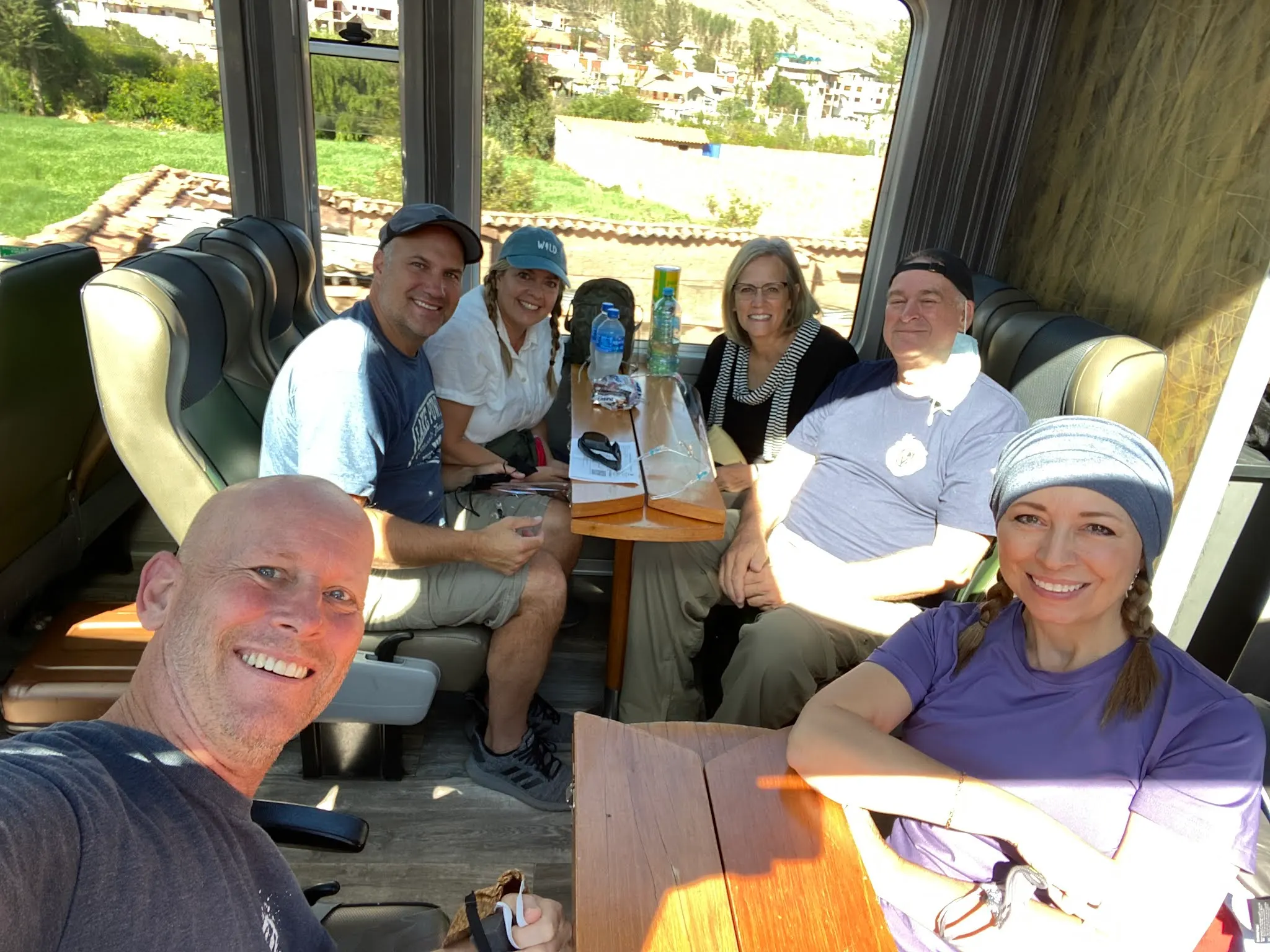 Us enjoying the very slow train ride, but very beautiful, to Machu Picchu Pueblo.