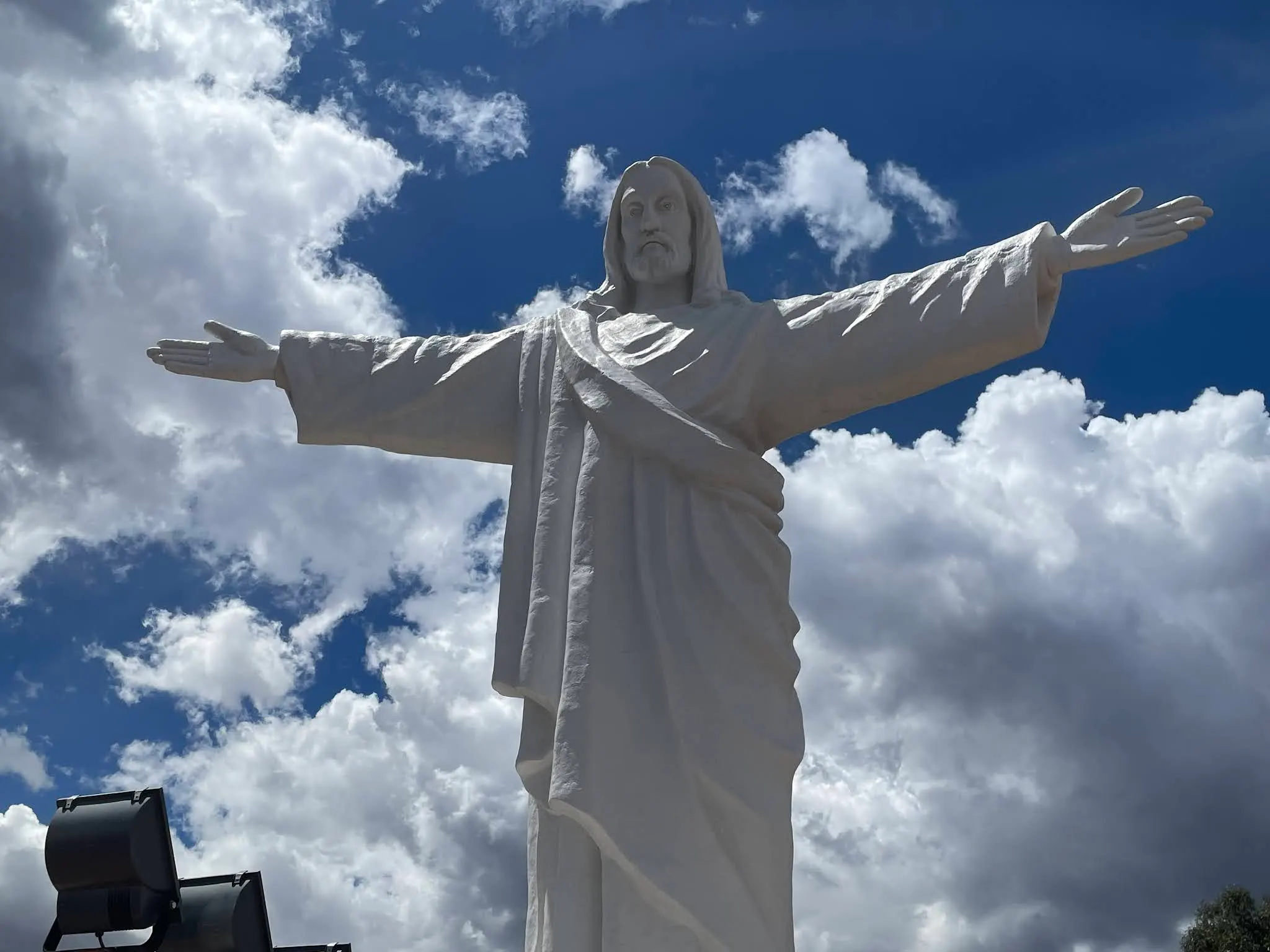 This is called the Cristo Blanco (White Christ). He sits on a hill over looking Cusco and is lighted at night.