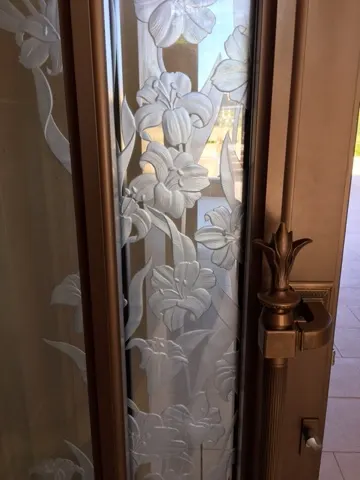 The temple is full of etched glass with beautiful flowers grown in France.