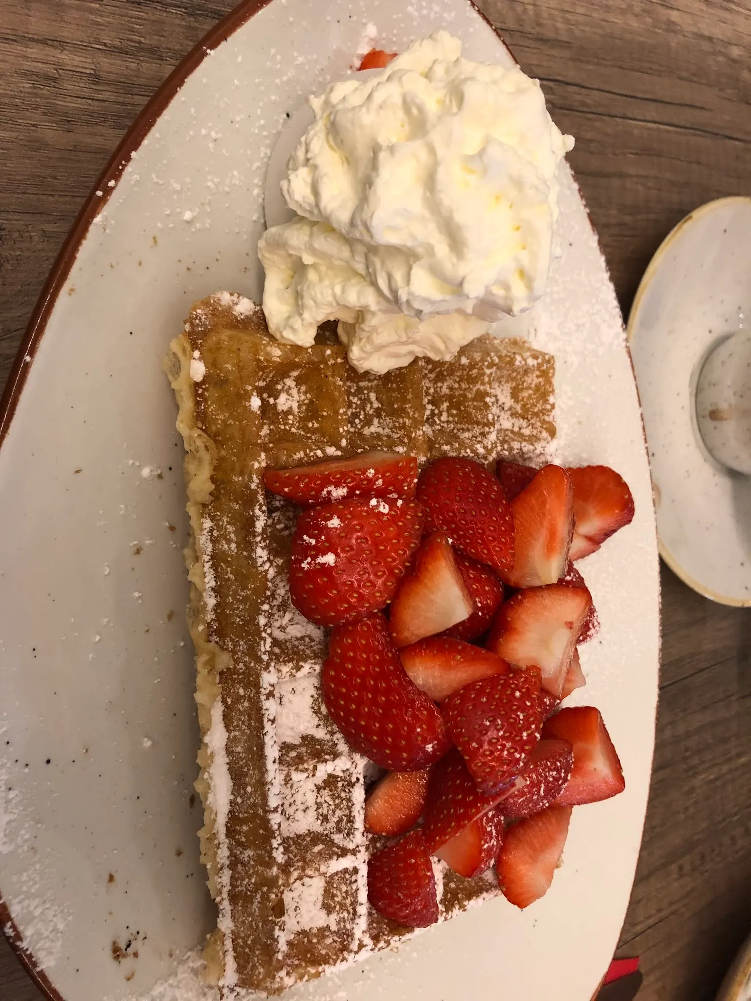 Someone’s waffle. Not mine. I had warm cherries on mine.