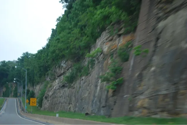 The rocky sides of the road are so beautiful.