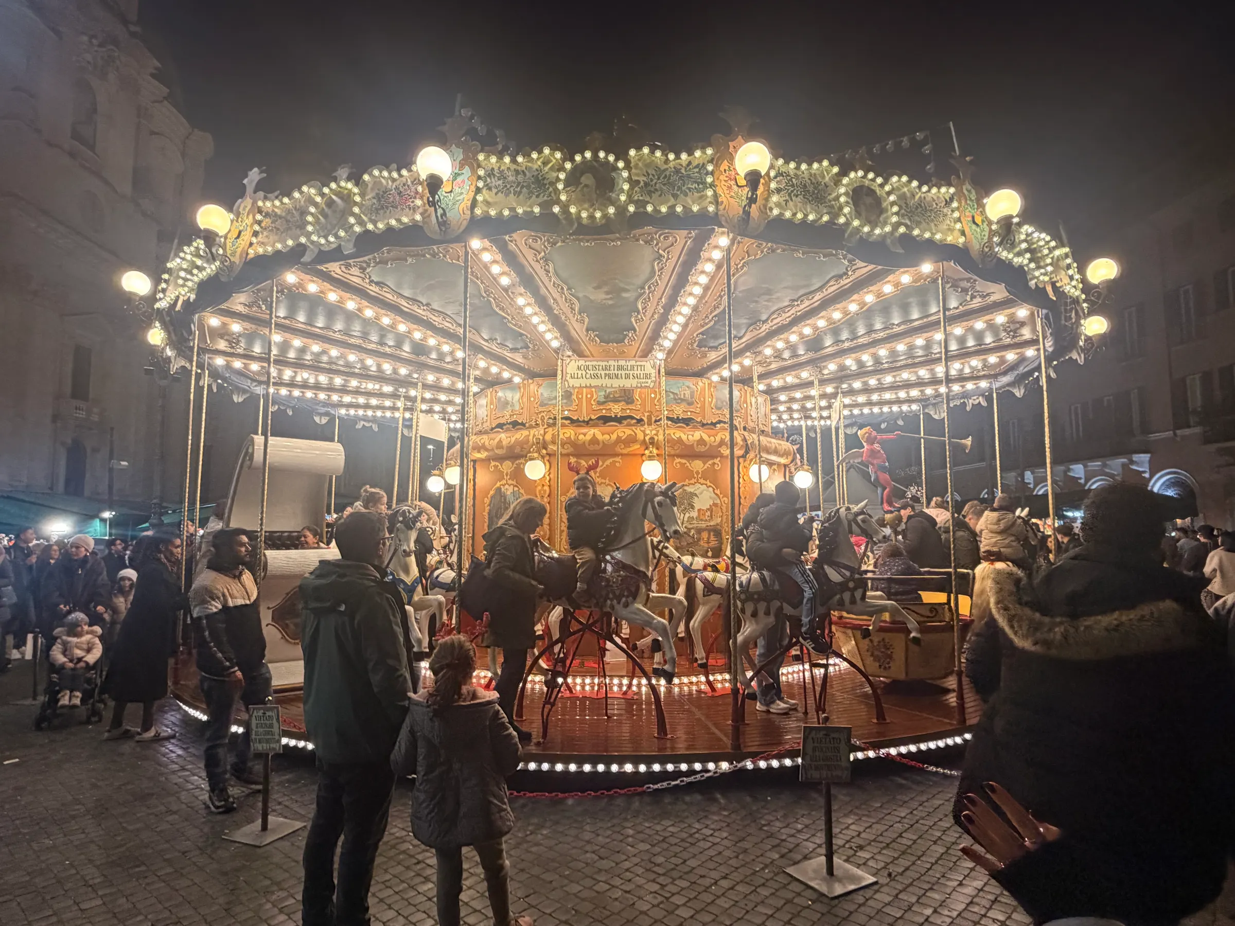 Denise wanted to ride this. Should I be surprised? She had her eye on a horse that rocked but I think a little child had it and she knew she would feel bad later if she bumped that child. So she chose not to ride it.