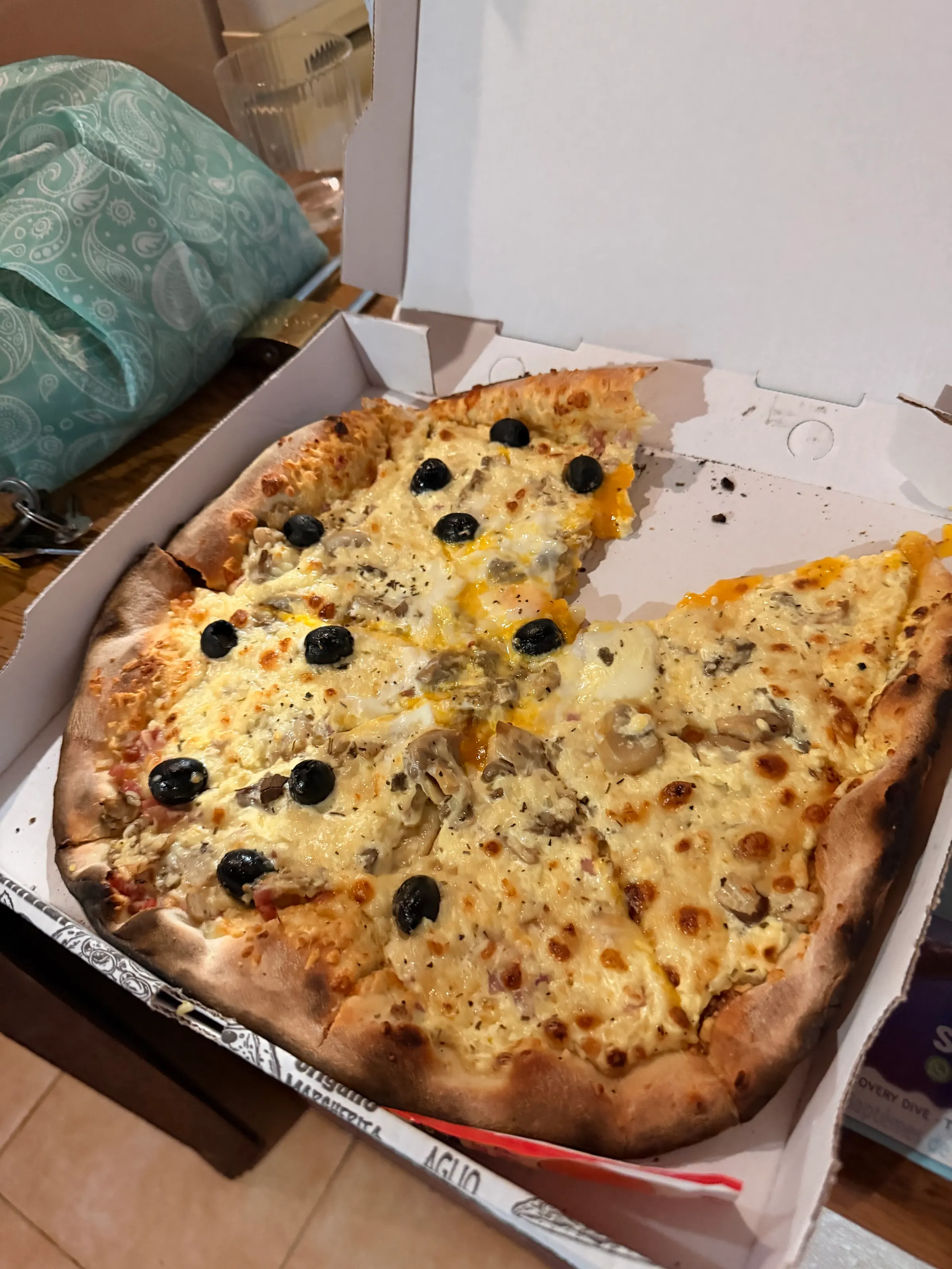 Our yummy dinner. White sauced pizza from a food truck.
