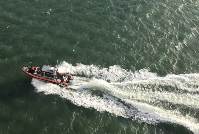 Coast Guard escort...makes me remember of Dustin's days in the Keys....