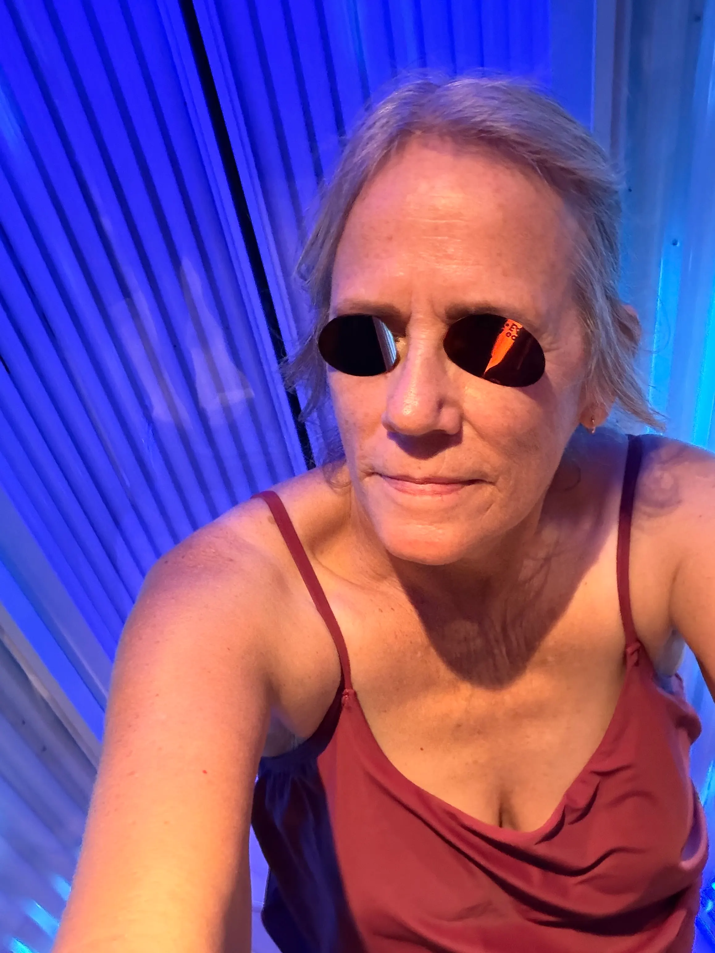 Denise getting ready for a swim…no…for a tanning session.
