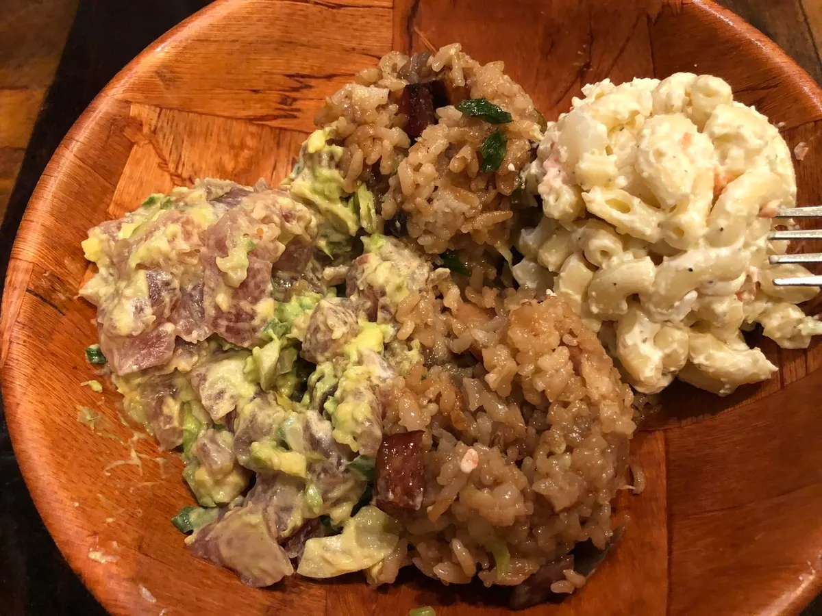 Our first and only Poke Bowl...so good. We were licking our fingers. It was calle Da Avo as it was in a Avocado Aioli sauce. The Ahi Tune as amazing. And you also see fried rice and macaroni salad...staples here.