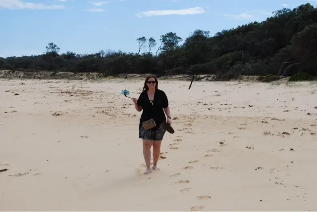 A woman and her selfie stick...what more do you want in life?