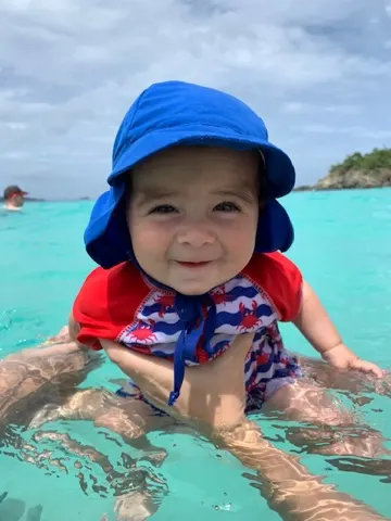 Isn't he so darn cute?! What a great little traveler and guy he is. He loved the ocean water.