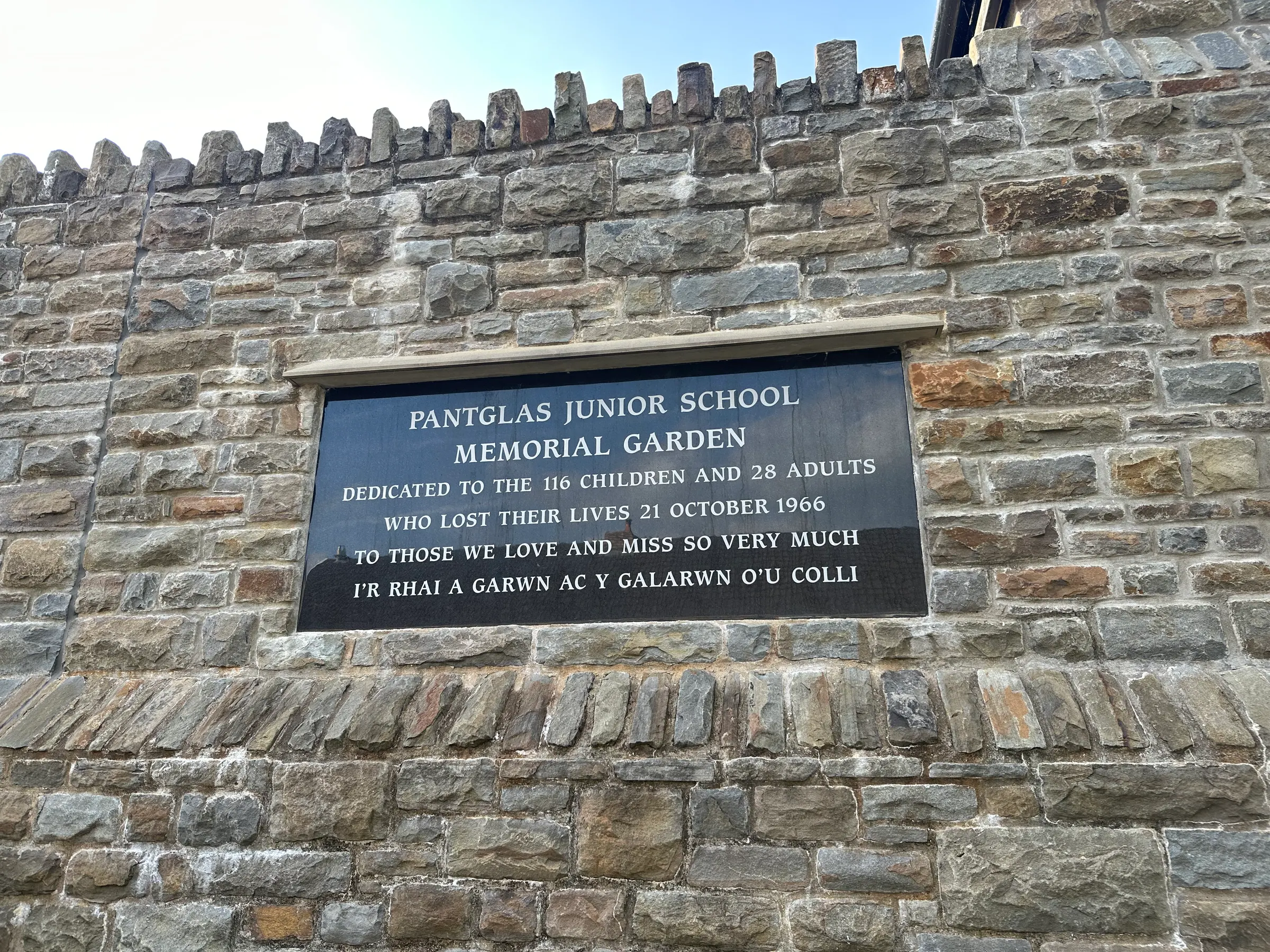 The memorial plaque for the school, children and adults at the Aberfan garden.