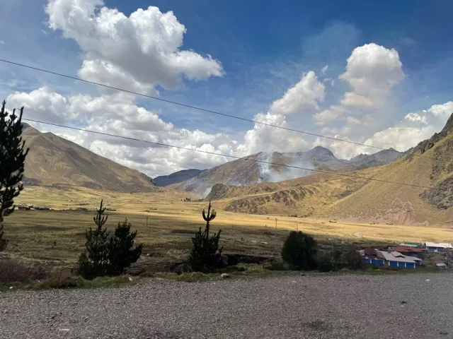 Along the way there was a forest fire that you can see in the distance there. We are in the high planes of Peru and there is little vegetation other than agriculture.