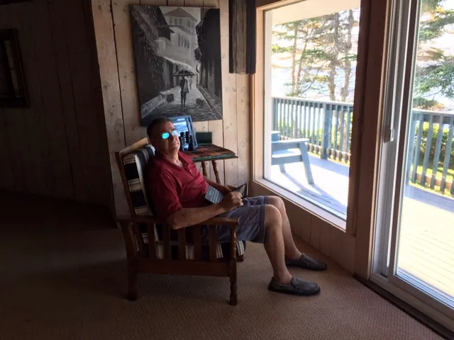 The blogger....writing while watching the ocean float by.