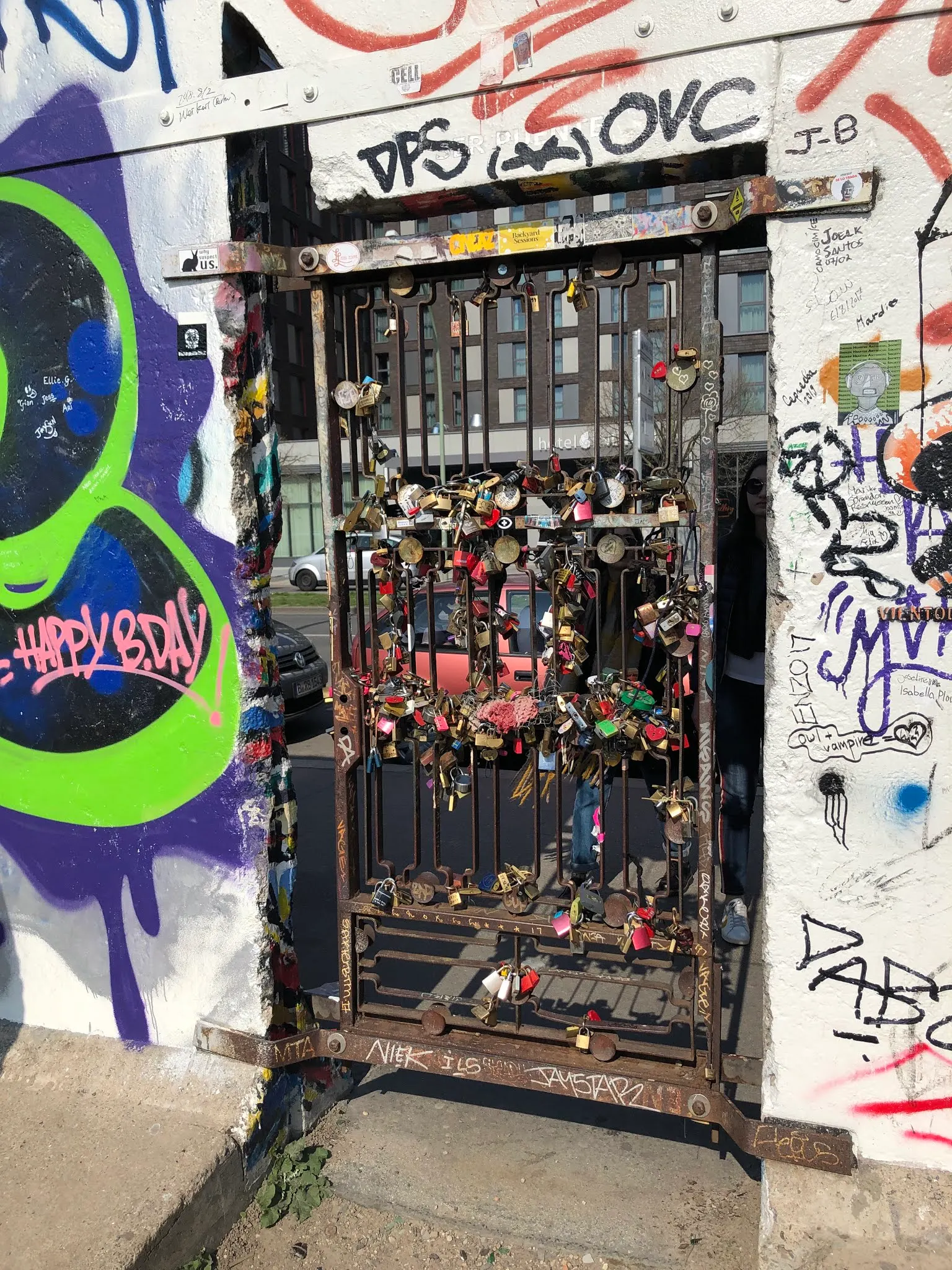 Gate on the wall full of locks...