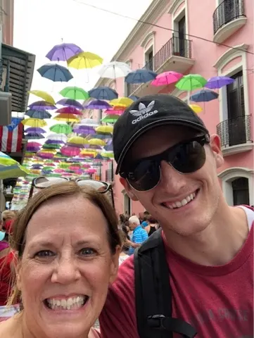 Walking the streets in old San Juan, we came across this street with umbrellas hanging from wire. It was quite pretty. And there were many people enjoying it.