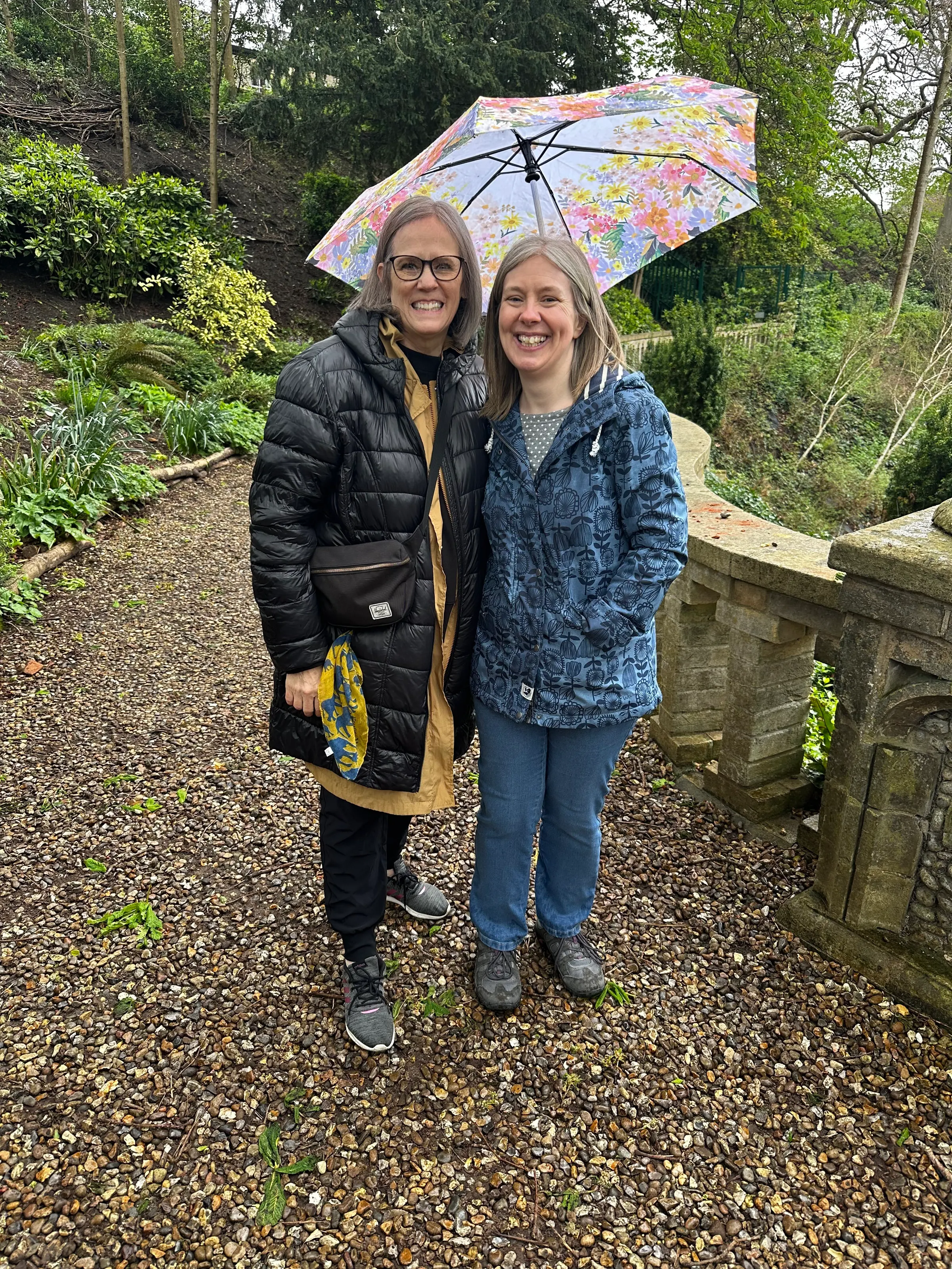 Anne Murray and Denise under an umbrella. It rained on us most of the day. And it was cold.