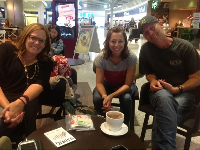 It is 3 AM and we're still smiling as we wait to catch our plane to the island of Santorini!