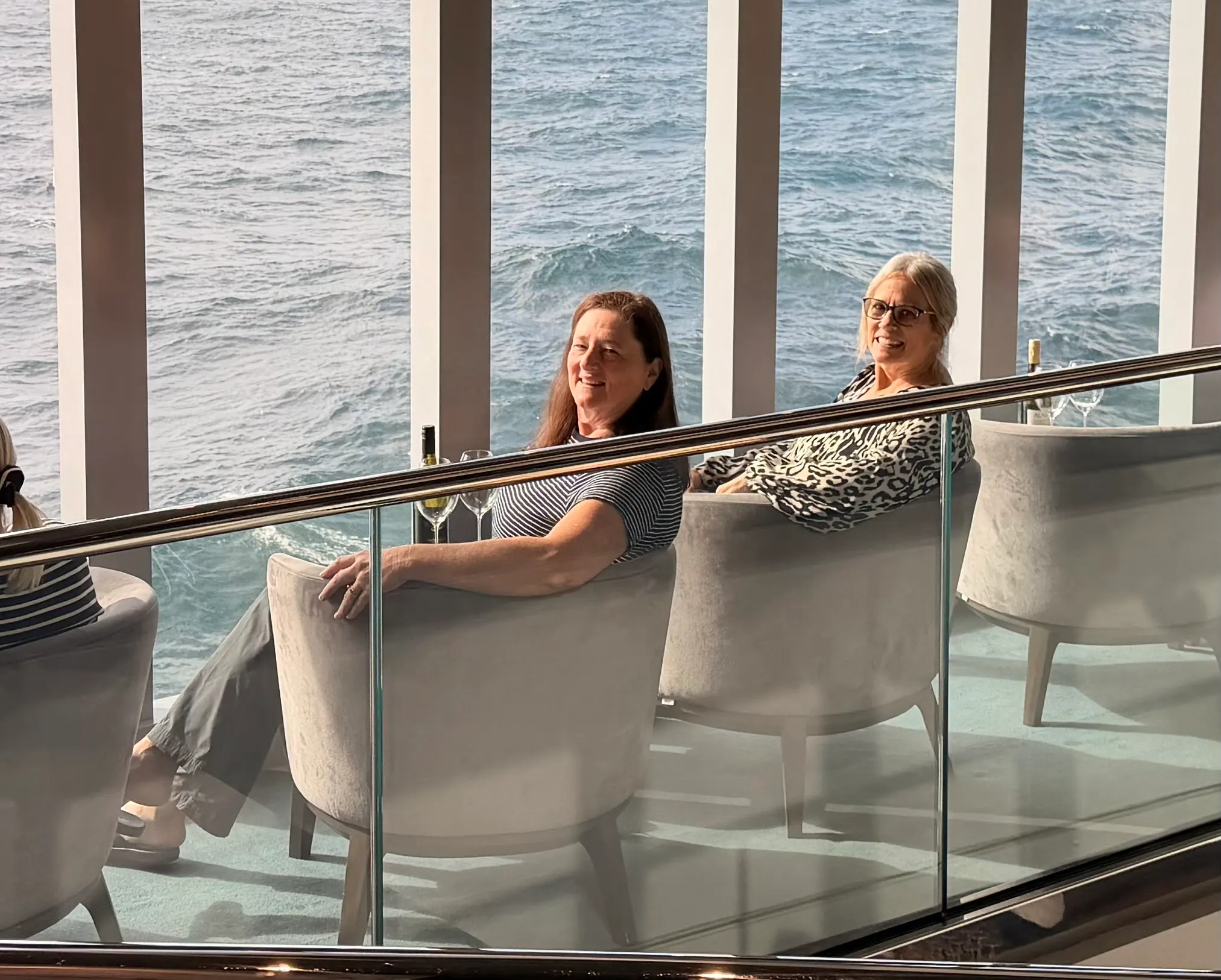 Ilene and Denise catching some sun rays in reserved seats in some lounge. It’s the wine bar and some group had it reserved. It didn’t stop them though.